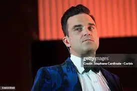 Robbie Williams: A Journey Through Music and Philanthropy