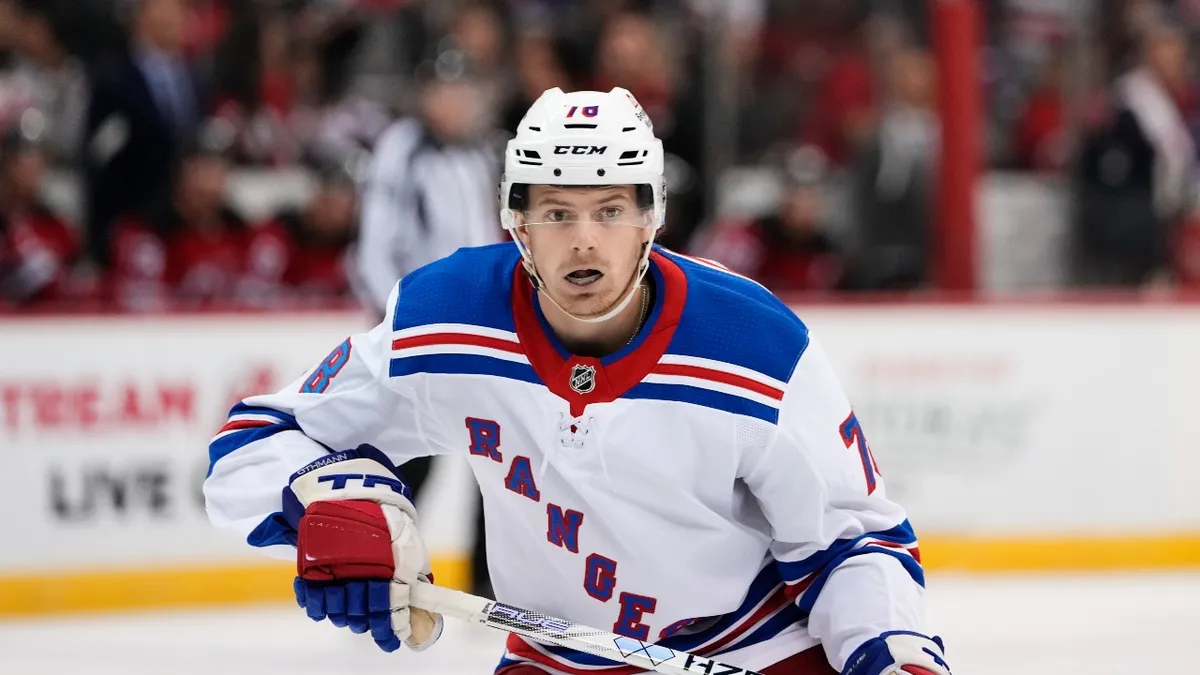 Brennan othmann traded to Calgary Flames